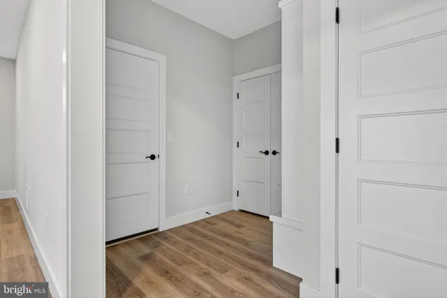 a bathroom with a shower toilet and sink