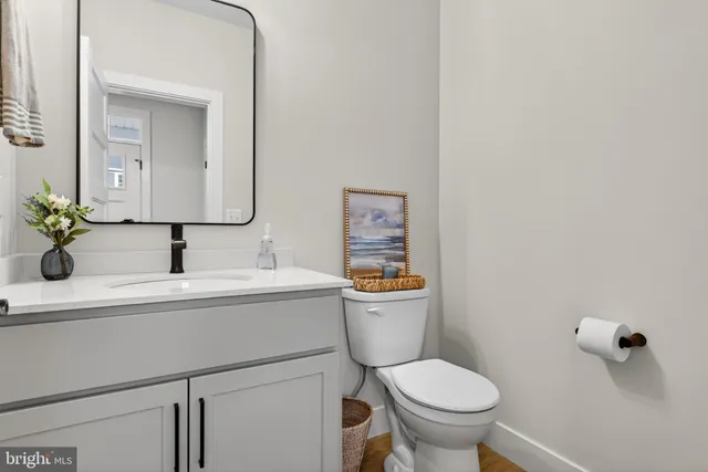 a bed room with a bed and a chair