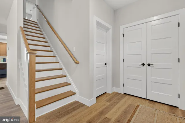 a view of a hallway with staircase