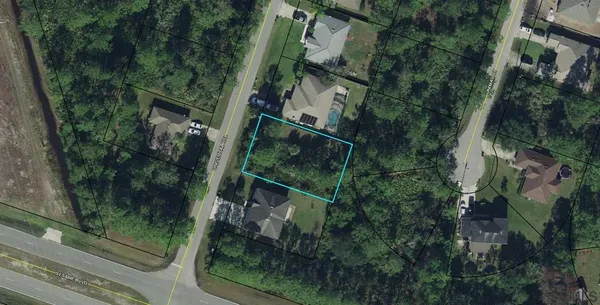 an aerial view of houses with yard