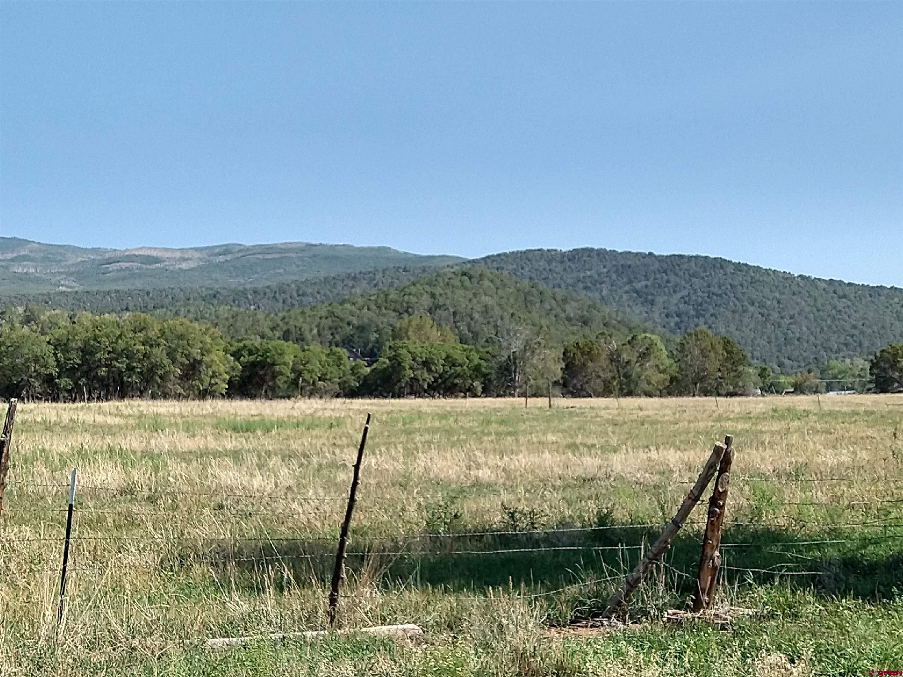 20122 2375th Road Cedaredge, CO 81413 - Photo 6 of 26 a view of lake and mountain