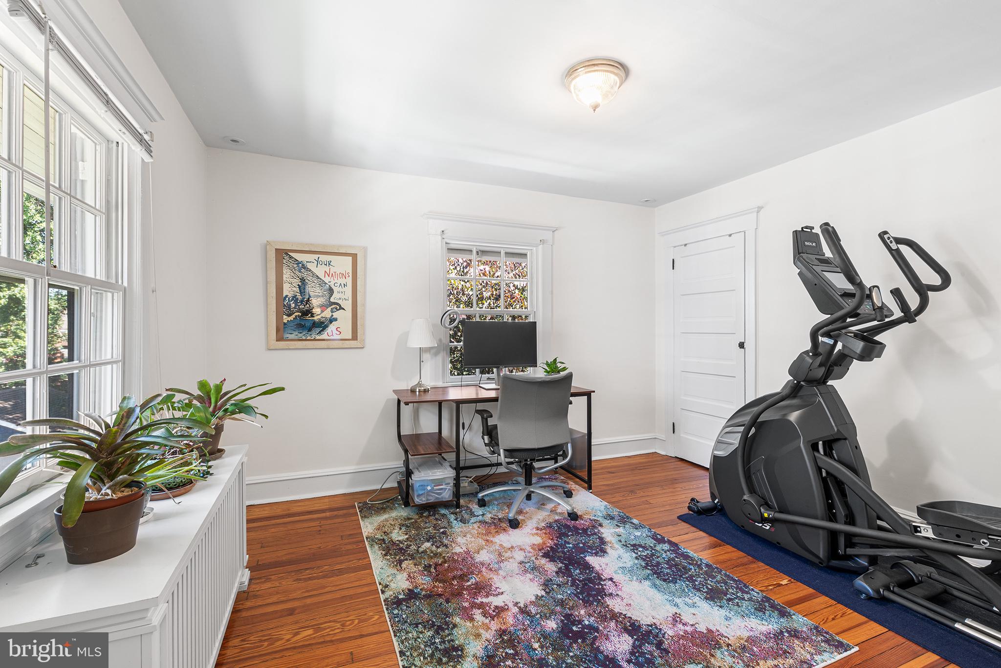 114 Simpson Road Ardmore, PA 19003 - Photo 26 of 37 a view of a workspace with furniture and a potted plant