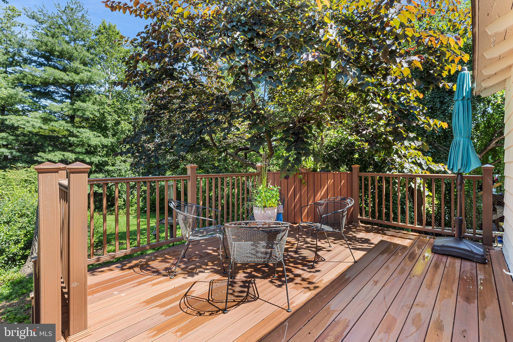 114 Simpson Road Ardmore, PA 19003 - Photo 35 of 37 a view of a deck with wooden floor and outdoor seating