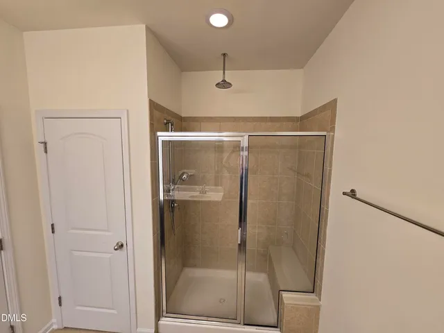 a view of a hallway with closet area