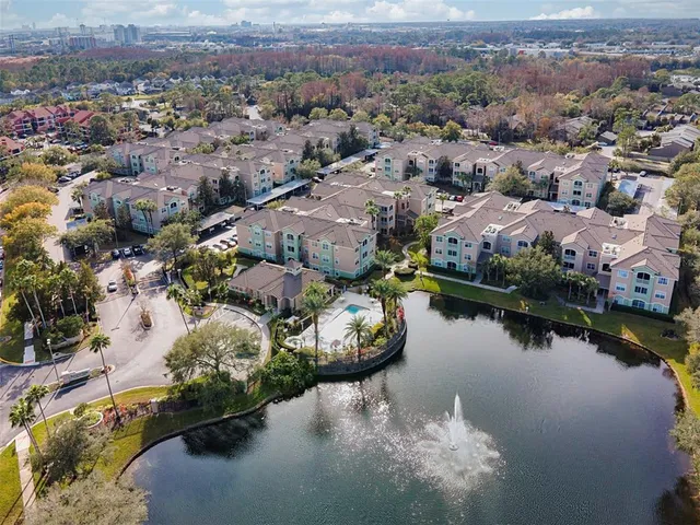 an aerial view of lake residential house with outdoor space