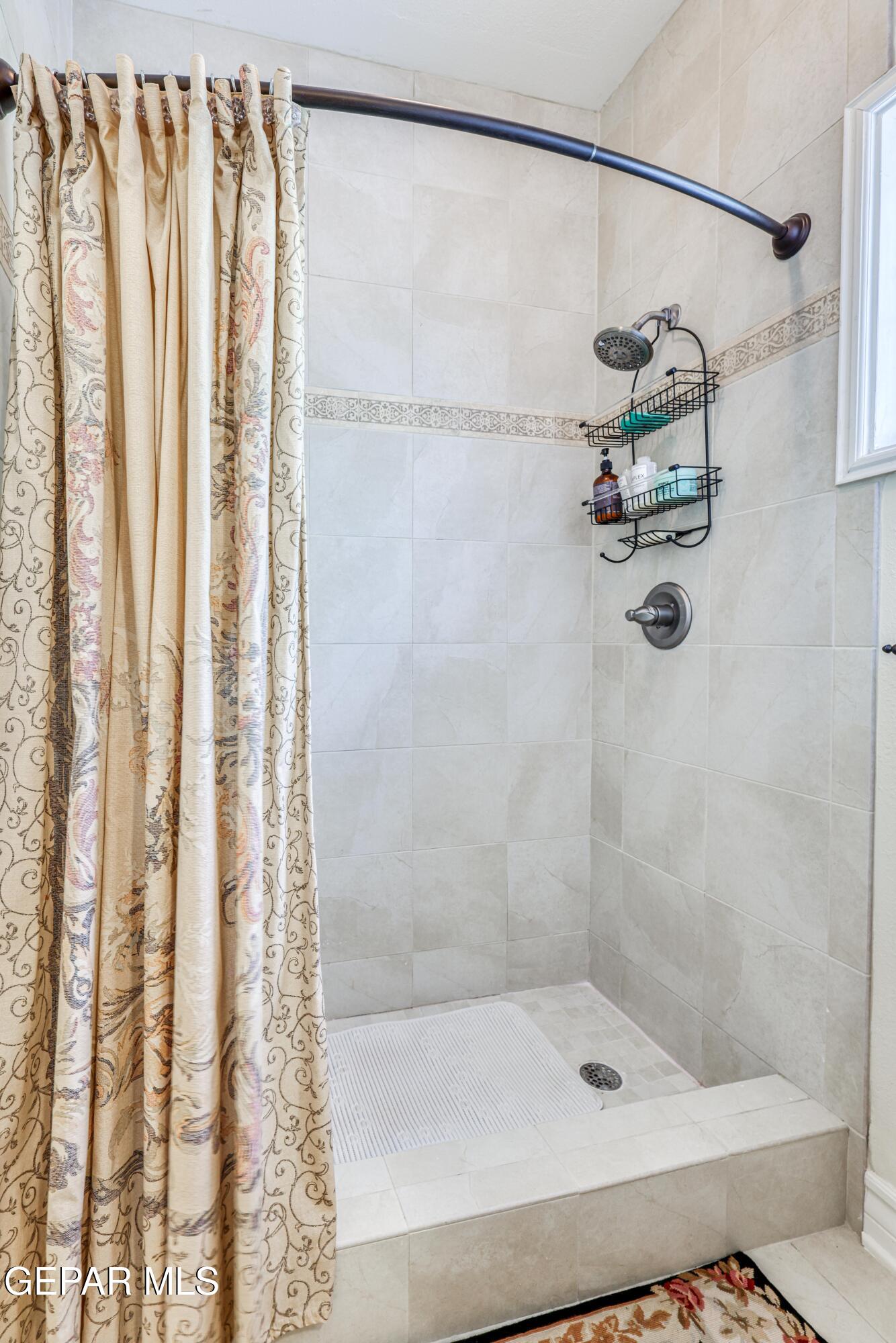 501 Country Club Road El Paso, TX 79932 - Photo 60 of 88 a bathroom with a shower