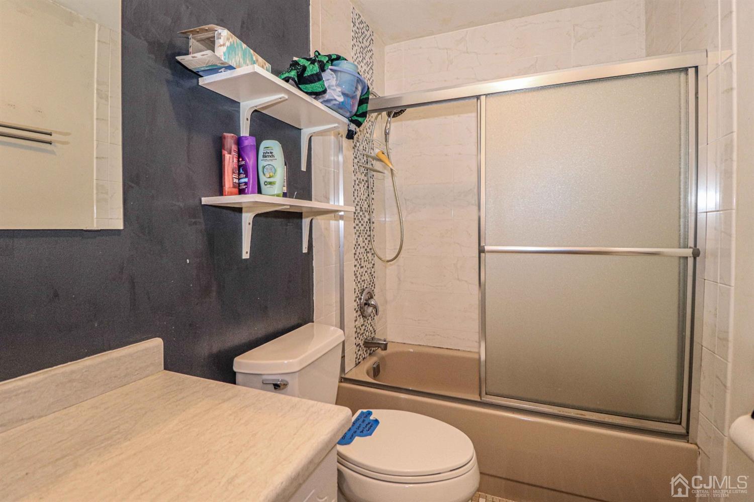 24 Redbud Road Piscataway, NJ 08854 - Photo 23 of 32 a bathroom with a toilet a sink and shower