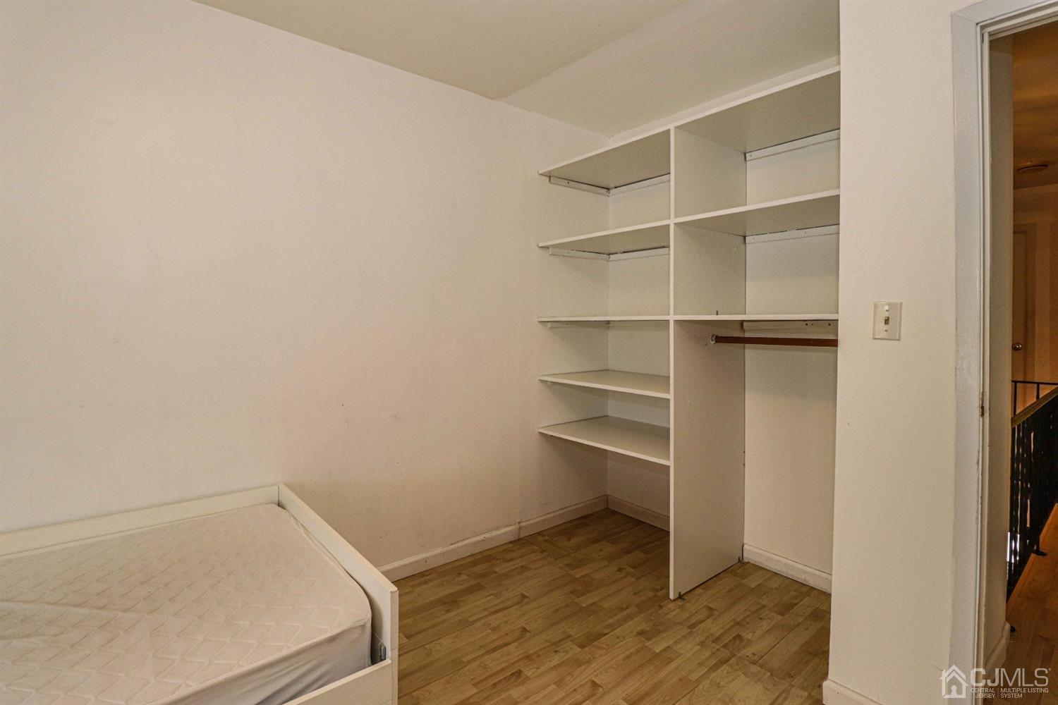 24 Redbud Road Piscataway, NJ 08854 - Photo 27 of 32 a view of an empty walk in closet