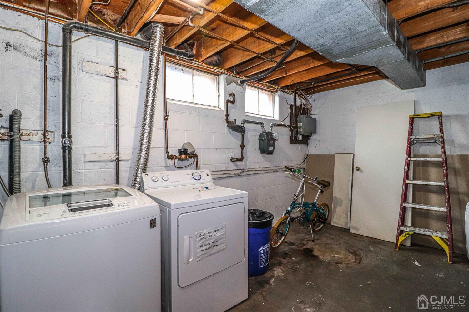 24 Redbud Road Piscataway, NJ 08854 - Photo 30 of 32 a utility room with dryer and washer