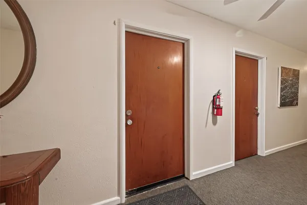 a view of elevator with hallway