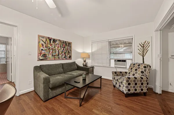 a living room with furniture and a couch
