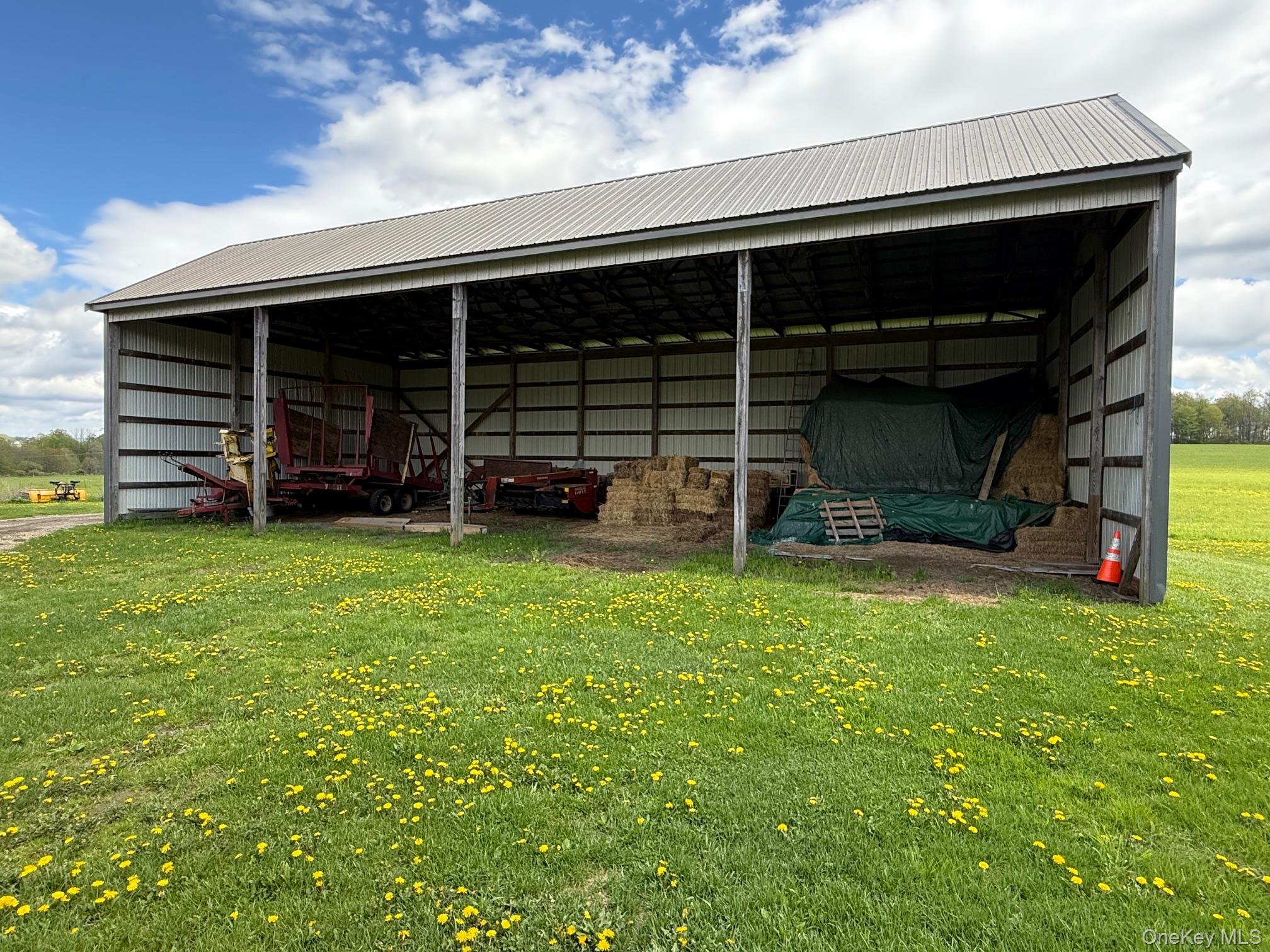 Skunks Misery Road Millerton, NY 12546 - Photo 13 of 23 a view of a backyard with wooden fence and a large tree