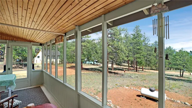 a view of a yard with a tree