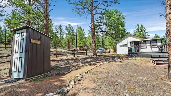 a kitchen with stainless steel appliances a stove a refrigerator and a sink