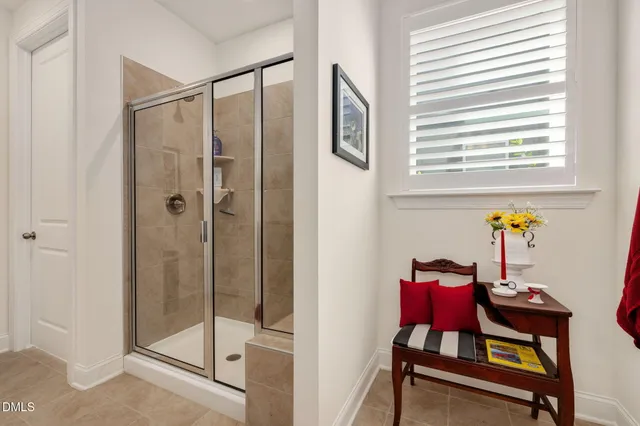 a view of a room with window and furniture