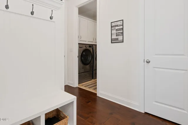 a view of hallway with washer and dryer