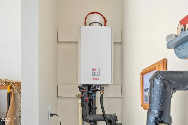 a balcony with furniture and a potted plant