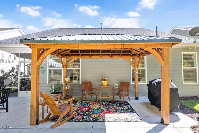 a outdoor space with lots of furniture and garden view