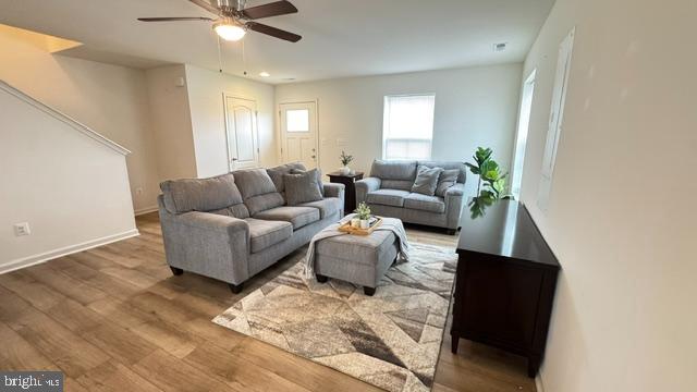 65 Chesterfield Road East Berlin, PA 17316 - Photo 7 of 32 a living room with furniture and a chandelier