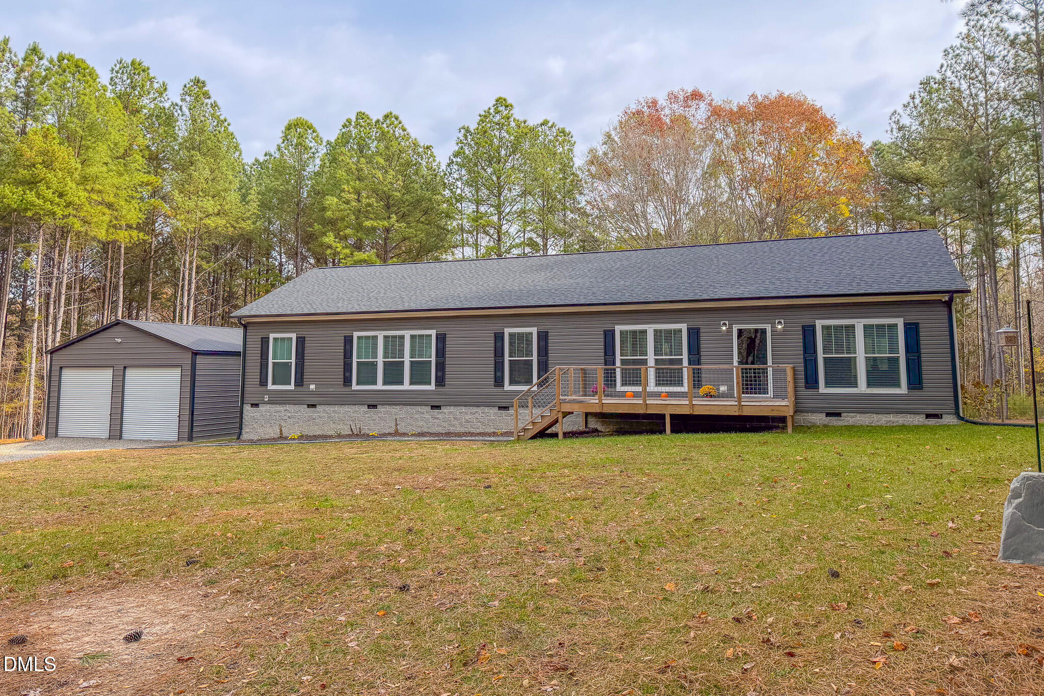 630 Clay Thomas Road Roxboro, NC 27573 - Photo 11 of 46 a front view of a house with garden