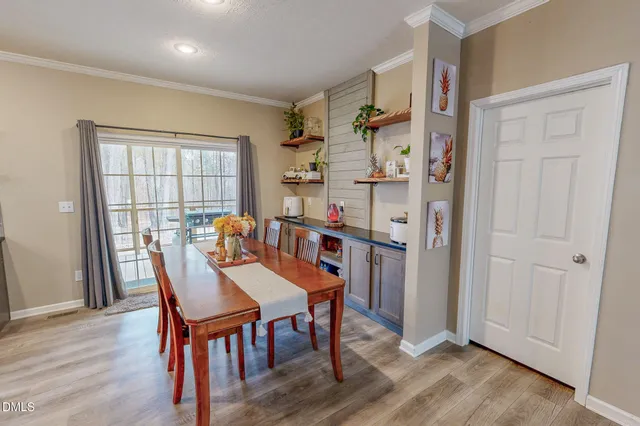 a view of livingroom with hardwood floor and a ceiling fan