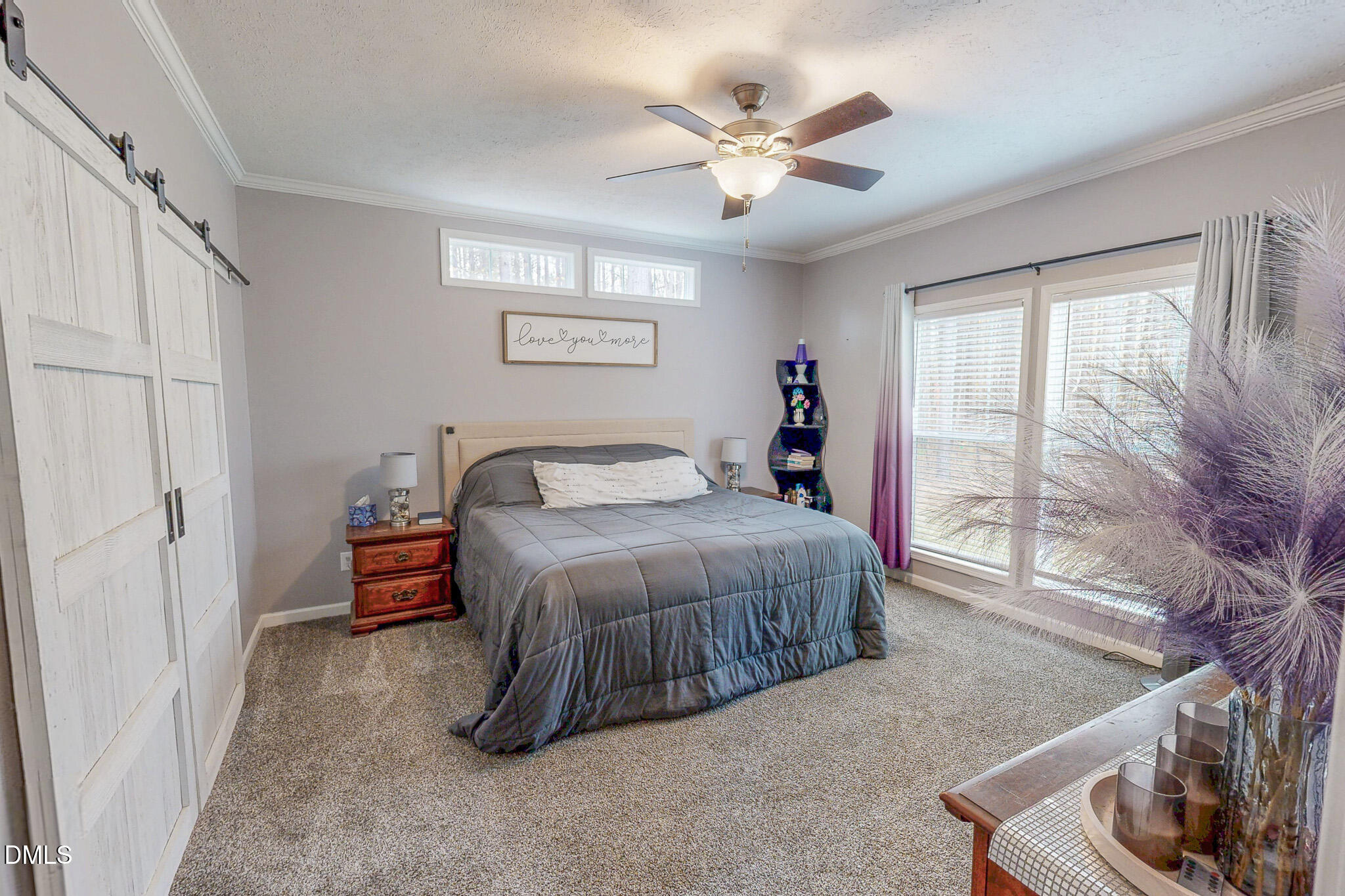 630 Clay Thomas Road Roxboro, NC 27573 - Photo 26 of 46 a bedroom with a bed and a window