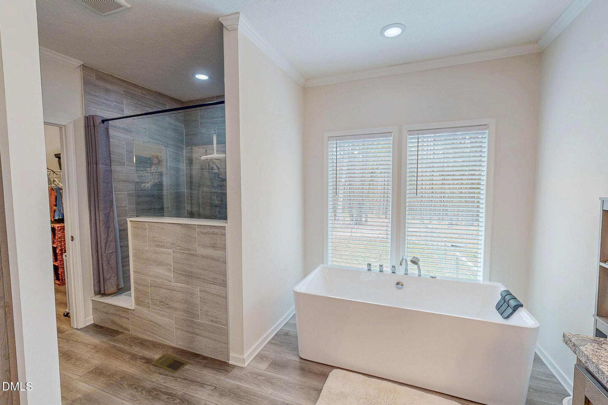 630 Clay Thomas Road Roxboro, NC 27573 - Photo 28 of 46 a bathroom with a bathtub and shower