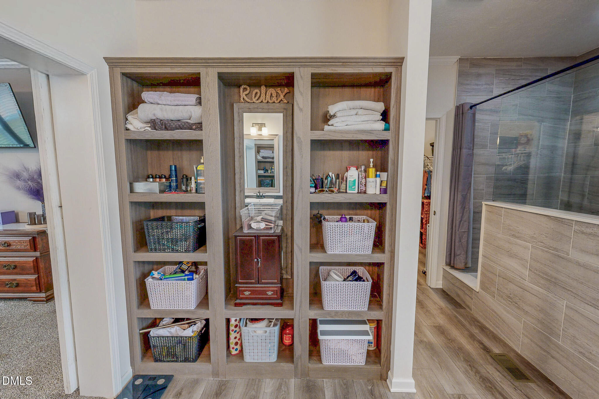 630 Clay Thomas Road Roxboro, NC 27573 - Photo 29 of 46 a view of walk in closet with clothes and shoes