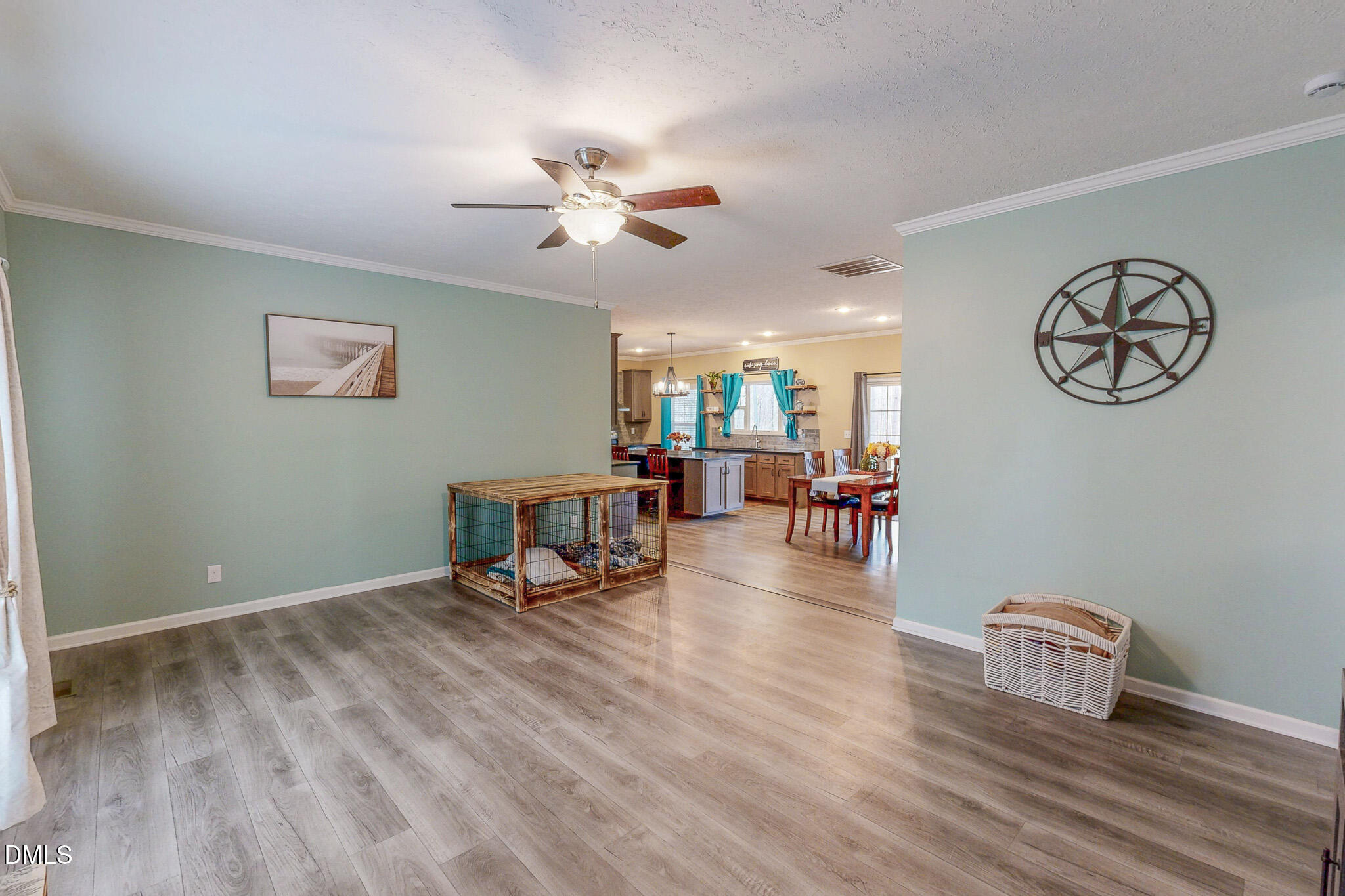 630 Clay Thomas Road Roxboro, NC 27573 - Photo 31 of 46 a living room with furniture and wooden floor