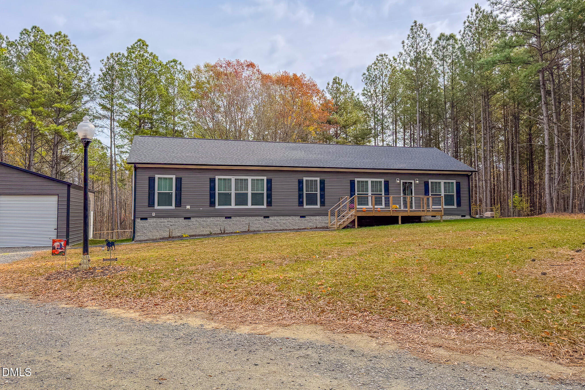 630 Clay Thomas Road Roxboro, NC 27573 - Photo 34 of 46 a front view of a house with a garden