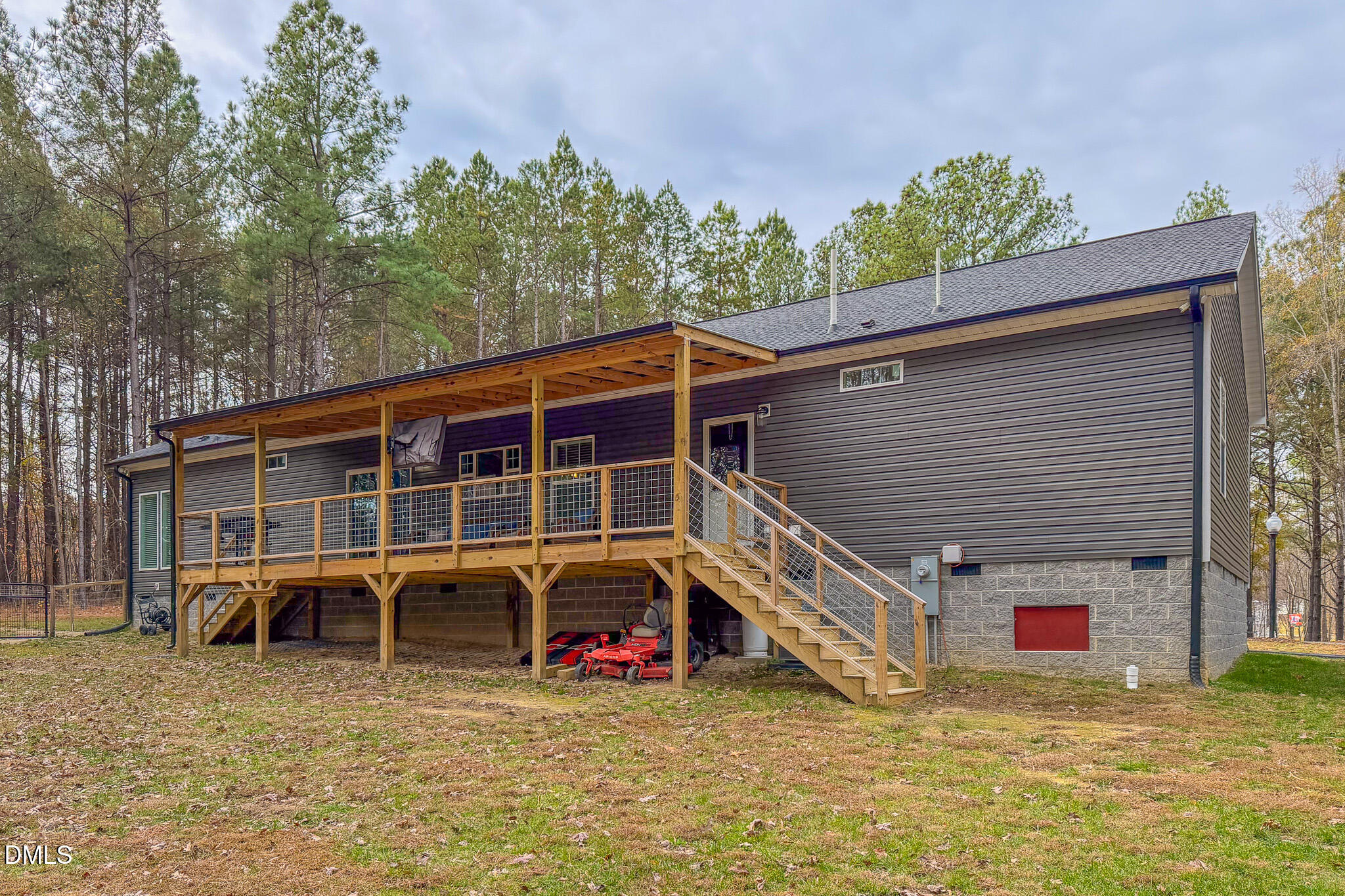 630 Clay Thomas Road Roxboro, NC 27573 - Photo 36 of 46 a view of a house with a yard and sitting area