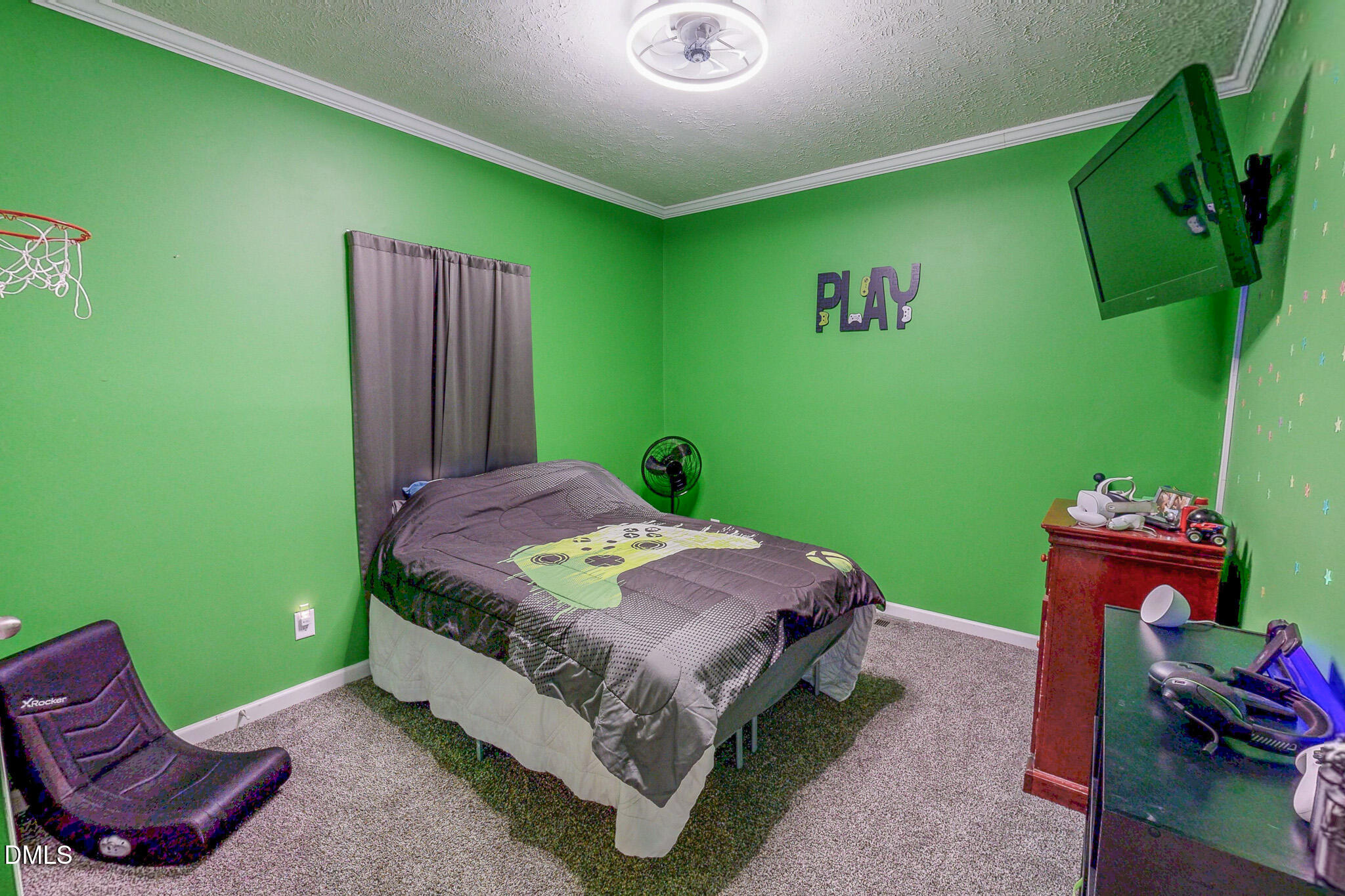 630 Clay Thomas Road Roxboro, NC 27573 - Photo 40 of 46 a bedroom with a bed and a dresser