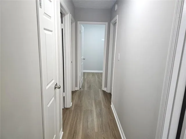 a view of a bathroom from a hallway