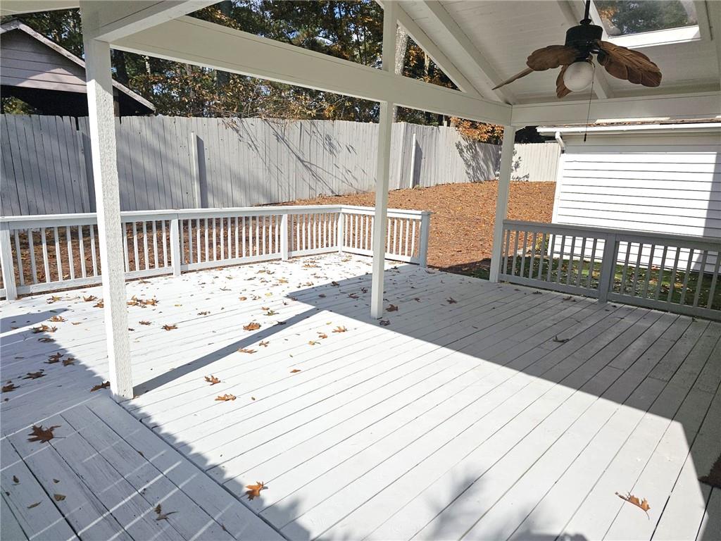 10085 Old Woodland Entry Johns Creek, GA 30022 - Photo 29 of 34 a view of a wooden deck