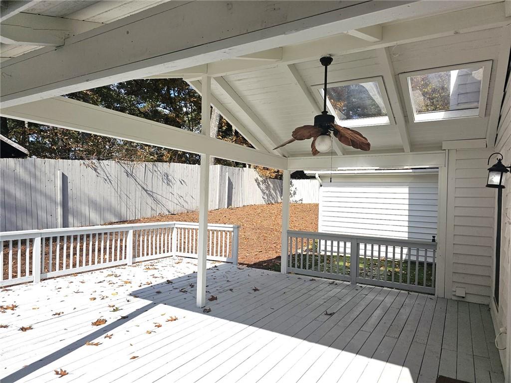 10085 Old Woodland Entry Johns Creek, GA 30022 - Photo 30 of 34 a view of a balcony with wooden floor