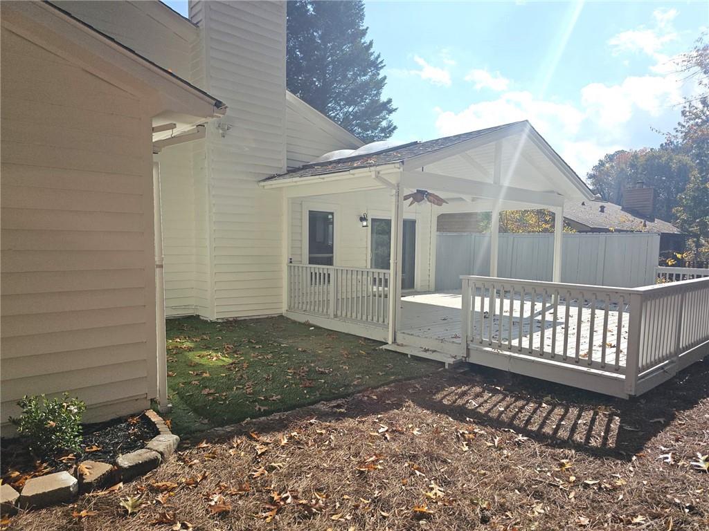 10085 Old Woodland Entry Johns Creek, GA 30022 - Photo 32 of 34 a view of a house with a yard