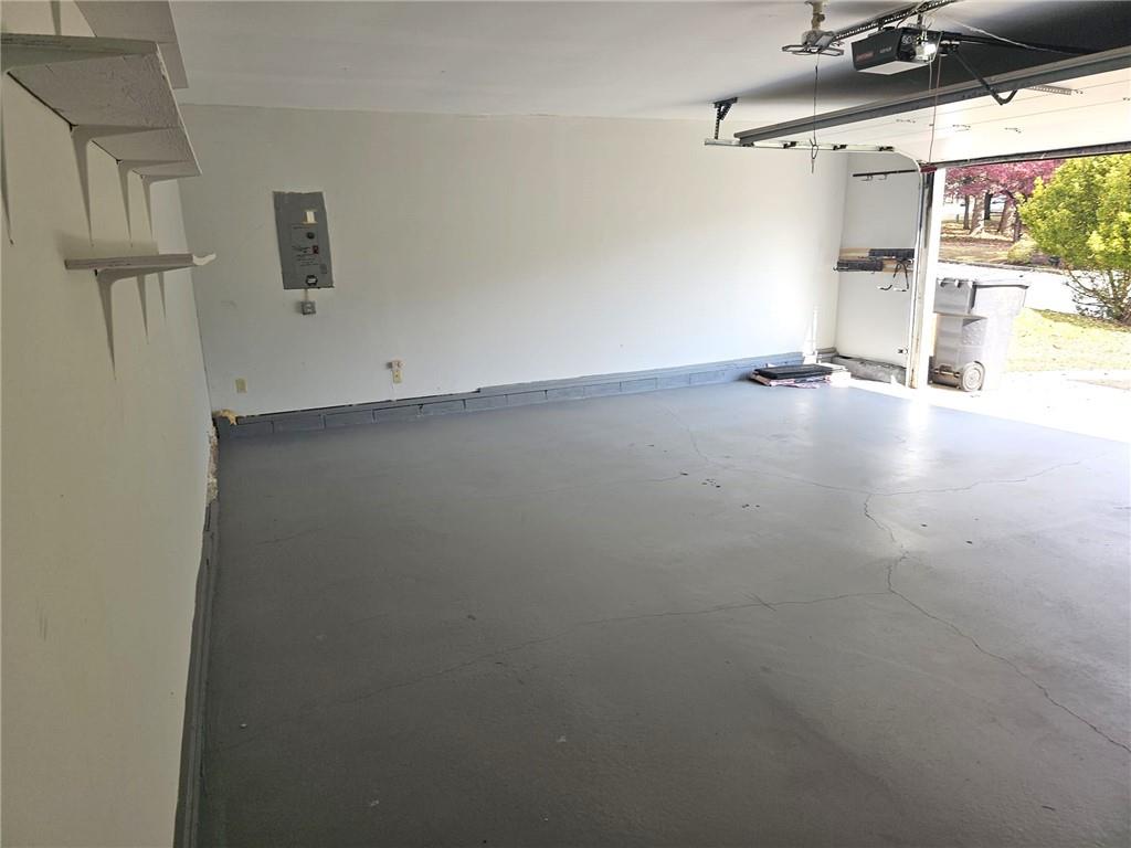 10085 Old Woodland Entry Johns Creek, GA 30022 - Photo 33 of 34 a view of a room with gym equipment