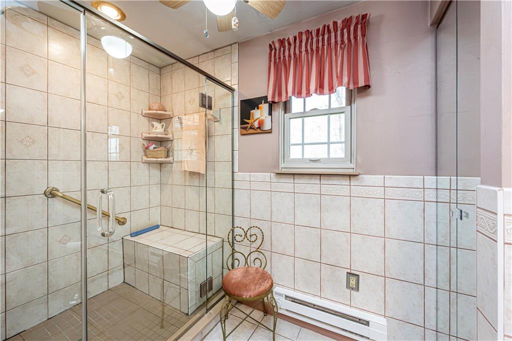 2037 Ridge Road Jeannette, PA 15644 - Photo 16 of 24 a bathroom with a shower