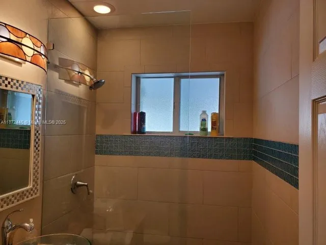a view of a bathroom with a shower