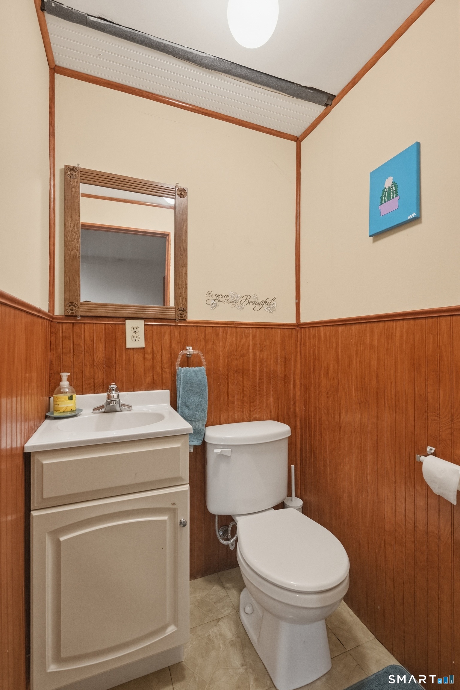 114 Beacon Valley Road Beacon Falls, CT 06403 - Photo 27 of 38 a bathroom with a toilet a sink and a mirror