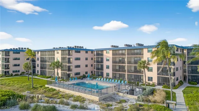 a view of a building with a yard