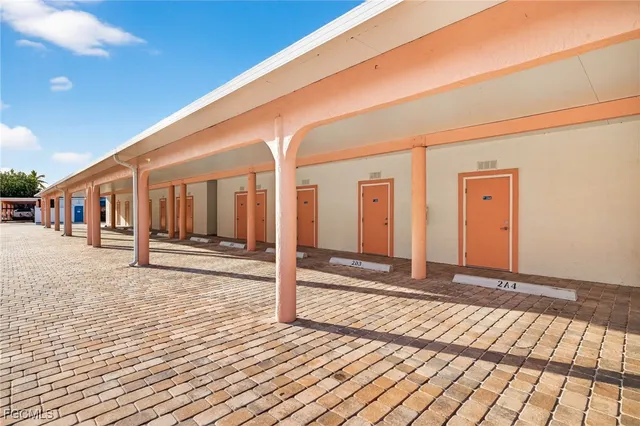 a view of a swimming pool outdoor seating