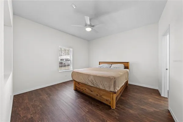 a bathroom with a double vanity sink and mirror