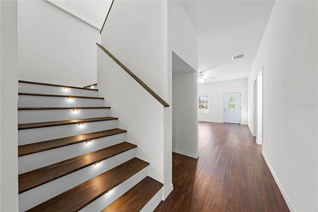a kitchen with a sink and a window