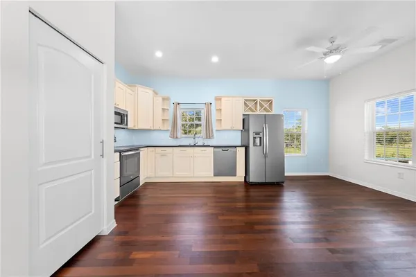 a kitchen with a stove and a sink