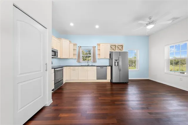 a kitchen with a stove and a sink