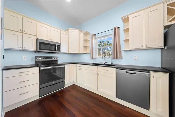a view of storage and utility room with washer and dryer