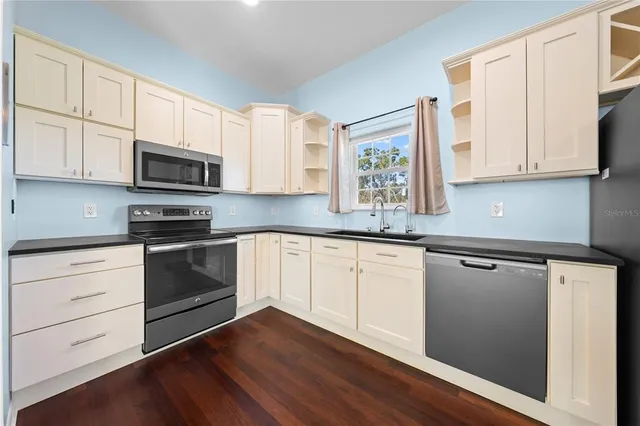 a view of storage and utility room with washer and dryer