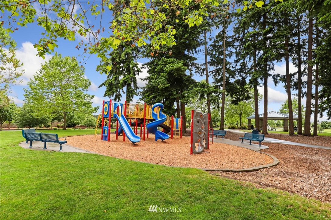 5433 66th Way Southeast Lacey, WA 98513 - Photo 17 of 20 a view of park with a slide