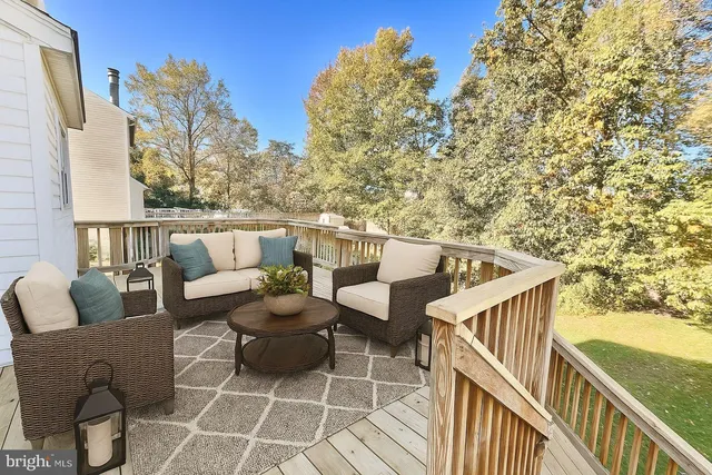 a view of balcony with wooden floor